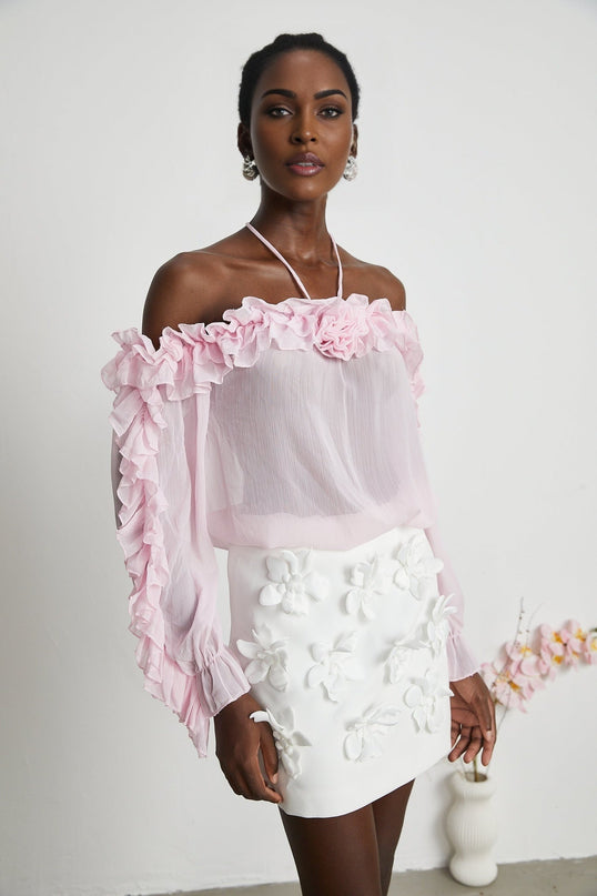 Sleeveless pink semi sheer top with straight neckline