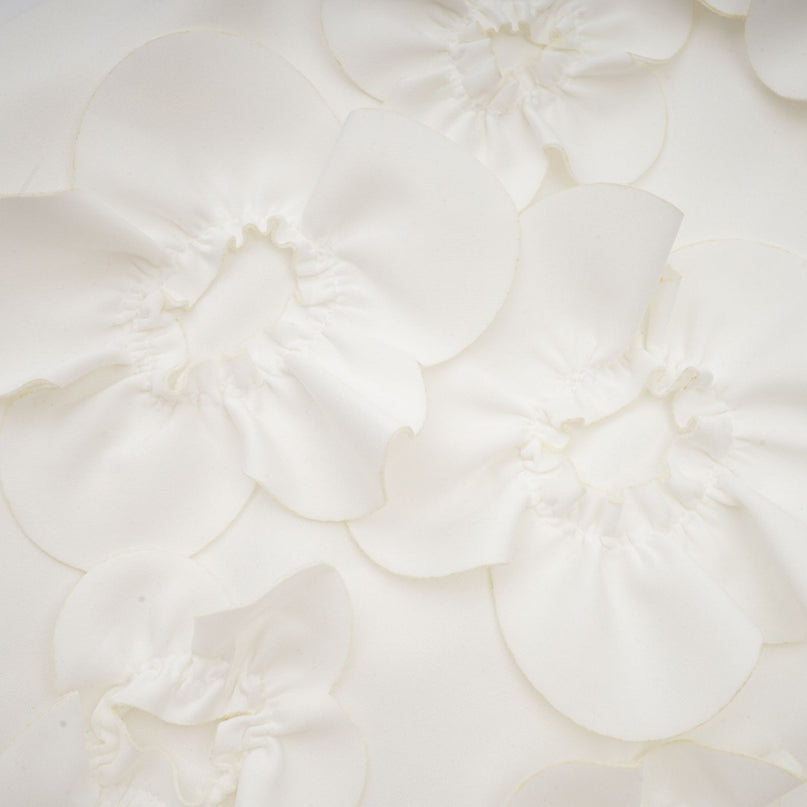 Sleeveless white maxi dress with bow and artificial flower decoration named Magali