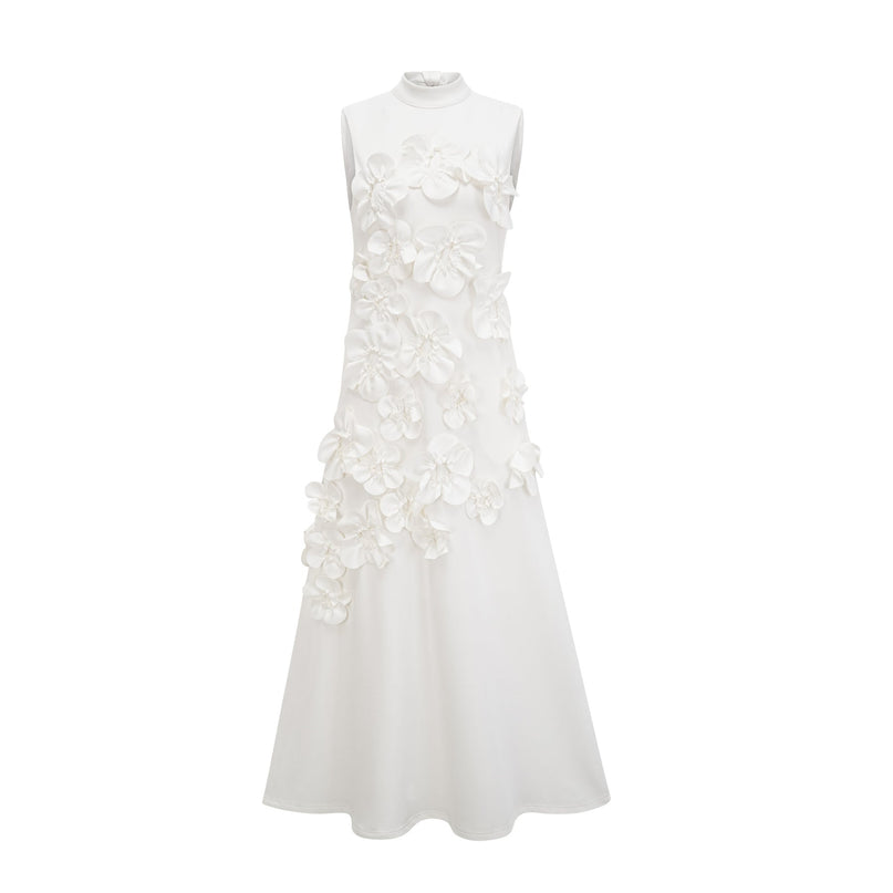 Sleeveless white maxi dress with bow and artificial flower embellishment named Magali