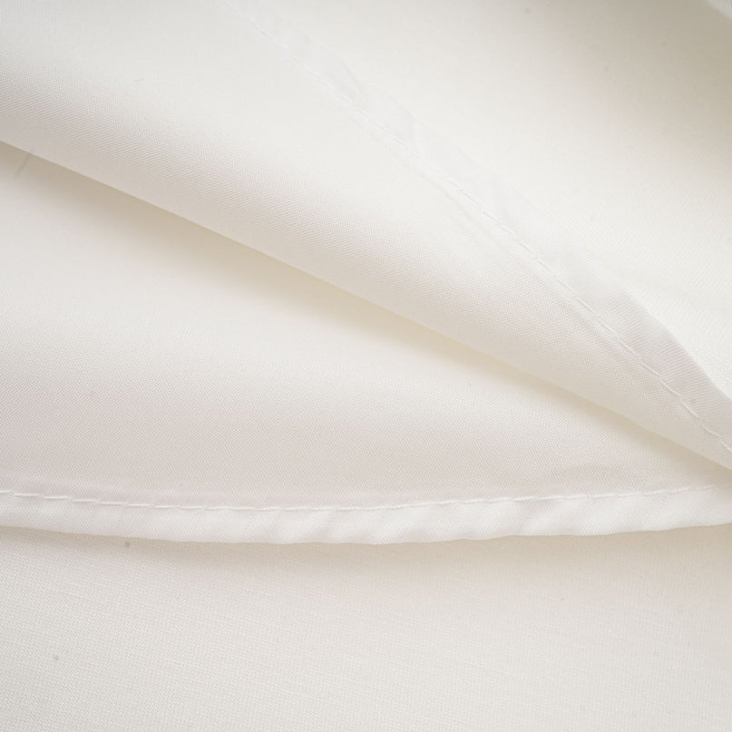 Sleeveless white maxi dress with bow and artificial flower embellishment named Magali