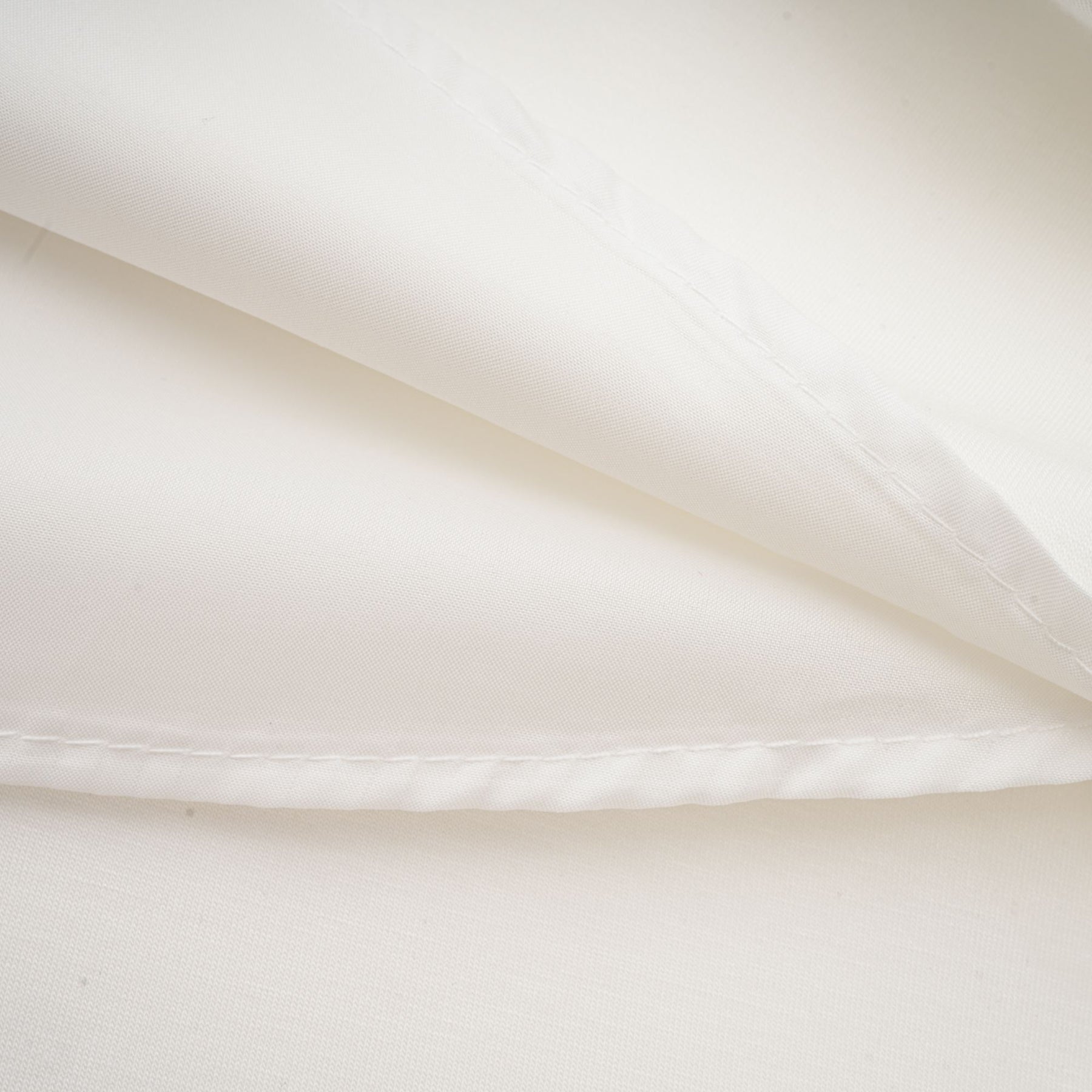 Sleeveless white maxi dress with bow and artificial flower embellishment named Magali