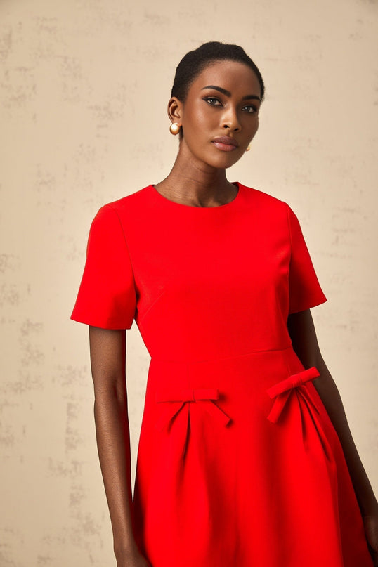 Sloan Red Flared Skirt Mini Dress with Bow Detailing in 100% Terylene