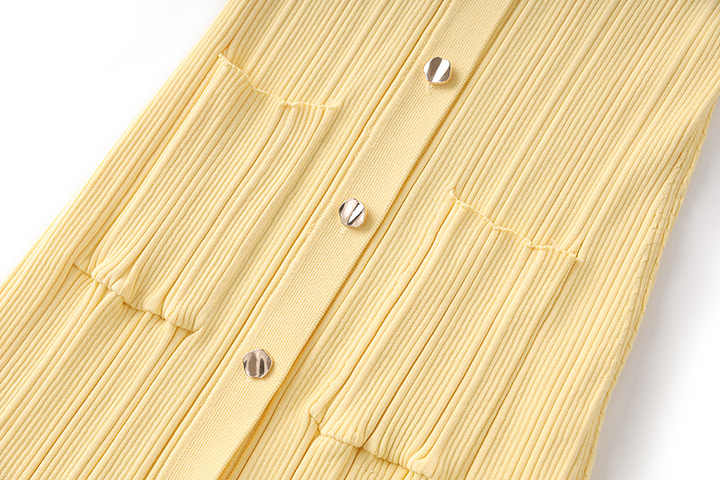 Soft pastel yellow ribbed knit maxi dress with flared bottom and collared button-down design