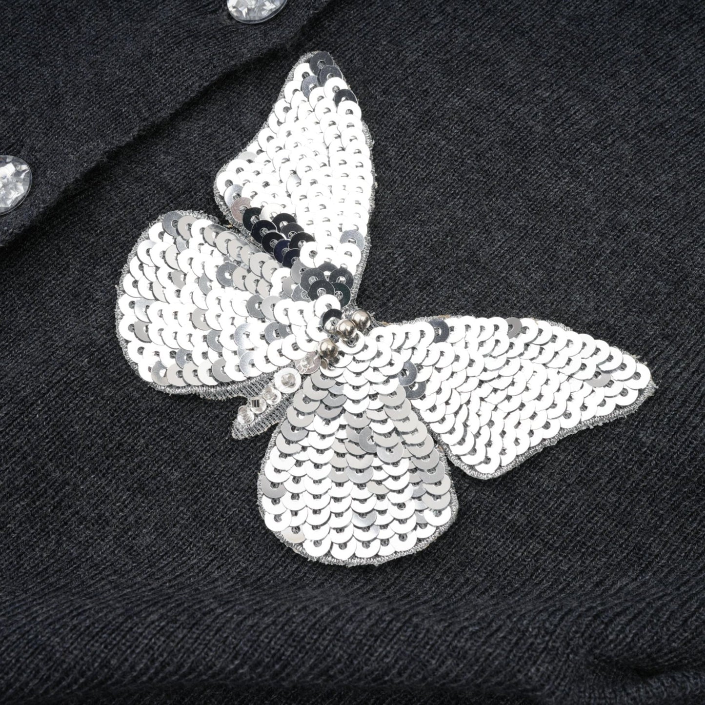 Sparkling grey cardigan with butterfly design featuring sequin embellishments