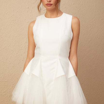 Stefania White Peplum Mini Dress with Ruffle Detailing and Scalloped Hem