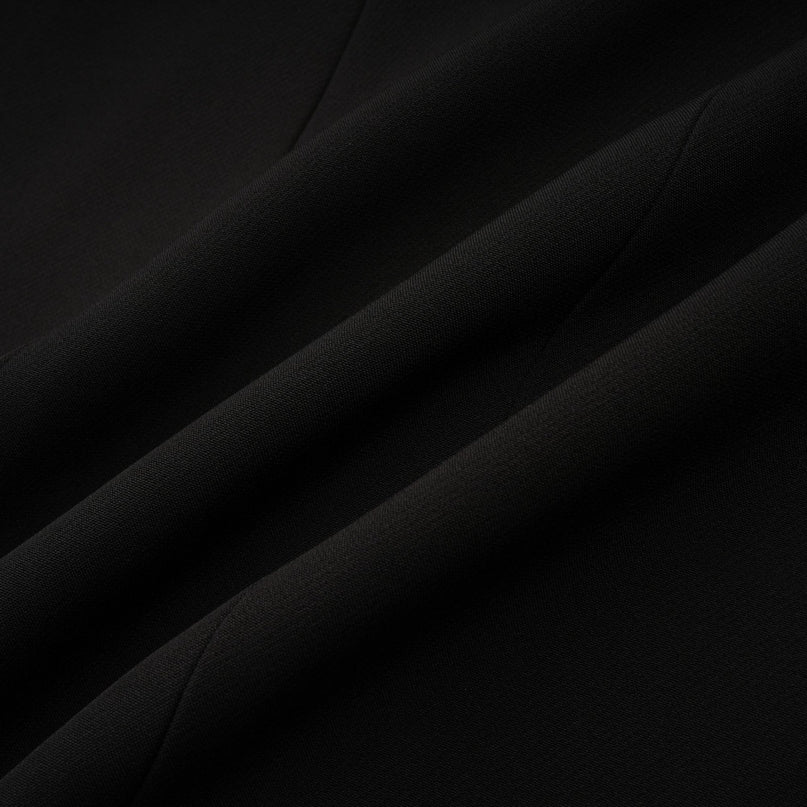 Stylish black blazer with bowknot detail and cutout design