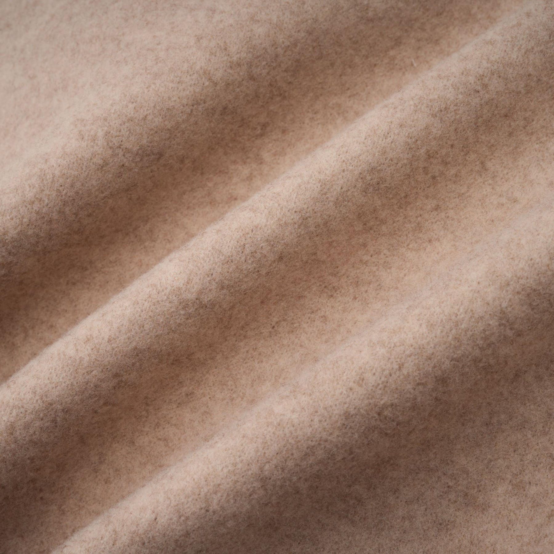 Stylish winter coat with detachable cape featuring faux fur in a deep red Rosella color