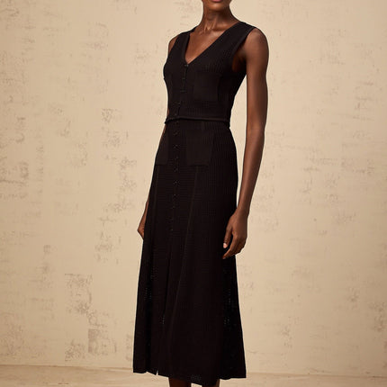 Teresa Black Pointelle Knit Top Skirt Set V Neck Sleeveless Design Front Patch Pockets Ribbed Hem Front Buttons Elasticated Waistband Front Slit Decorative Buttons Luxury Modern Silhouette 64% Viscose 36% Nylon Half Lining Calf Length Finish