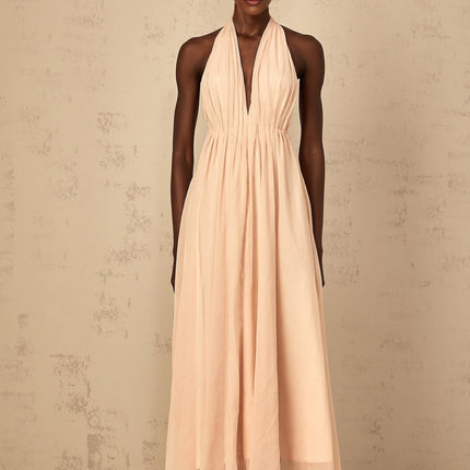 Teresa Maxi Dress in Peach Pink and Neutrals halter-neck silhouette shirred tulle open back design maxi length cinched waist 100% Terylene fiber intricate detailing rear tie zip fastening special occasions