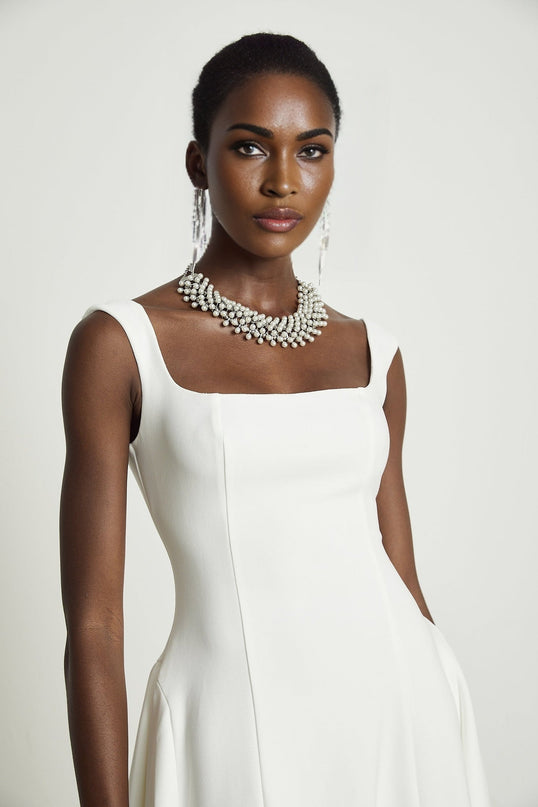 Thala White Sleeveless Midi Dress Square Neckline Tailored Bodice Pleated Details Flared Skirt Back Zipper Luxurious Blend Polyester Nylon Elastane Ceremonies Cocktail Events Formal Occasions Exquisite Piece Sophistication Grace