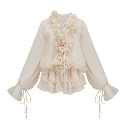 Tiered mini dress in neutral tones with floral applique details called Zephyrine