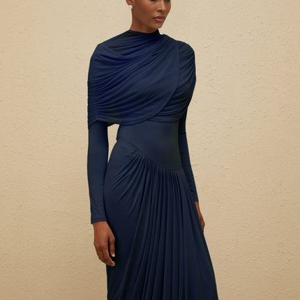 Tinsley Maxi Dress in Blue Navy Long Sleeve Mesh Shawl Pleated Detailing Asymmetrical Design Floor Length Luxury Style