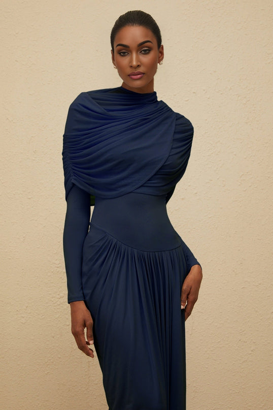 Tinsley Maxi Dress in Navy Blue crew neck long sleeves mesh shawl pleated detailing asymmetrical design floor length luxurious blend of 84% Polyamide and 16% Elastane