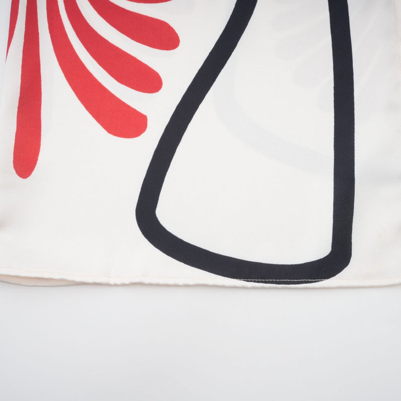 Two piece outfit with graphic print shirt and matching trousers in amaranta color