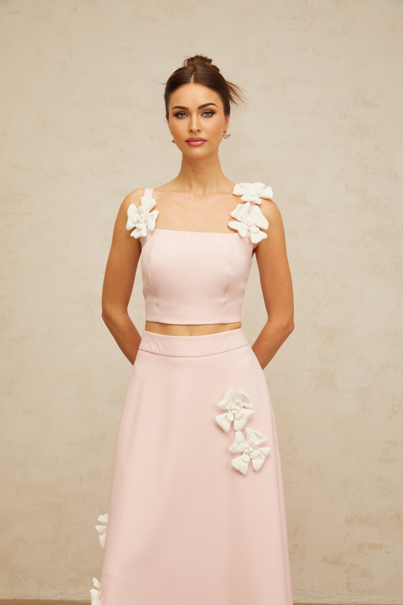 Two piece pink outfit with floral applique top and matching skirt