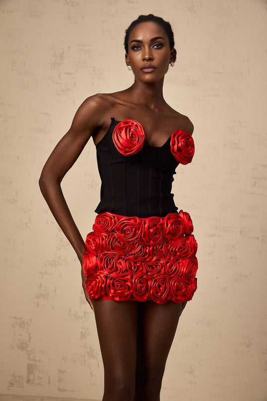 Two piece red outfit with rose appliques consisting of a top and skirt