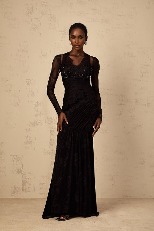 Ursula black mermaid style maxi dress with floral lace pattern full length view on model