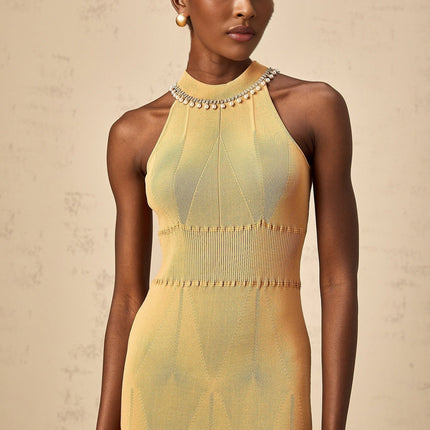 Valeria Sleeveless Midi Dress in Neutrals knitted construction fitted silhouette cinched waist faux-pearl crystal embellishments round neck calf-length hem rear button fastening luxurious blend Viscose Polyamide Elastane