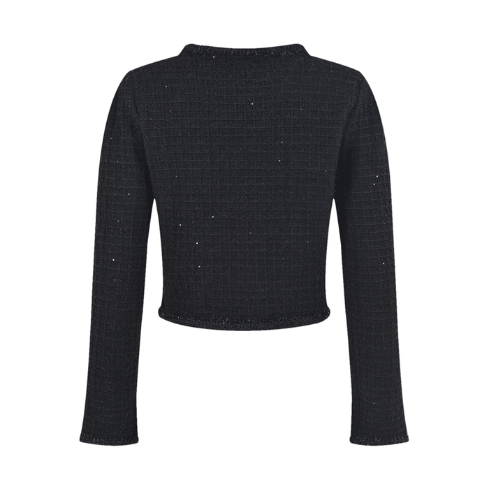 Black jacket with long sleeves round neck chest flap pockets front button fastening and waffleknit texture Made of 80% Polyester and 20% Cotton Matching black thighlength skirt with pleated edge also in waffleknit fabric blend