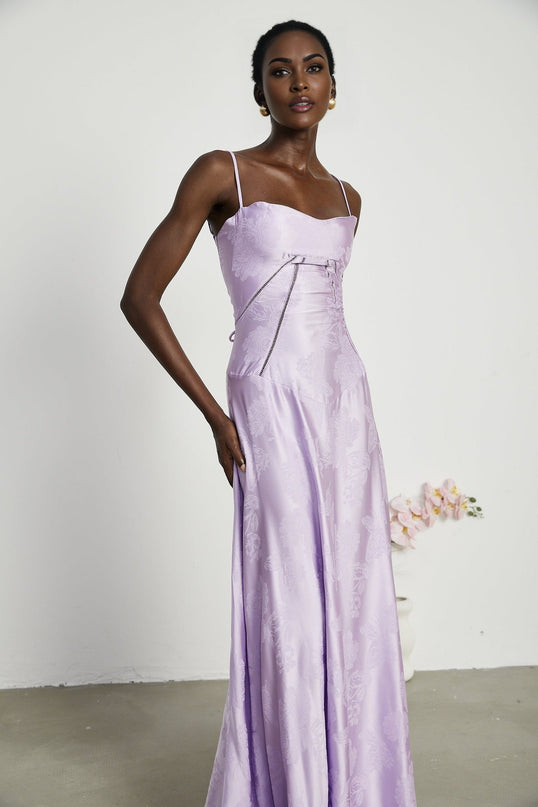 Valerie Purple Seraphina Jacquard Maxi Dress Spaghetti Strap Sleeveless Low-Cut Neckline Jacquard Fabric Side Zip Fastening Rear Tie Fastening Maxi Length Design Sizes Available Effortless Glamour