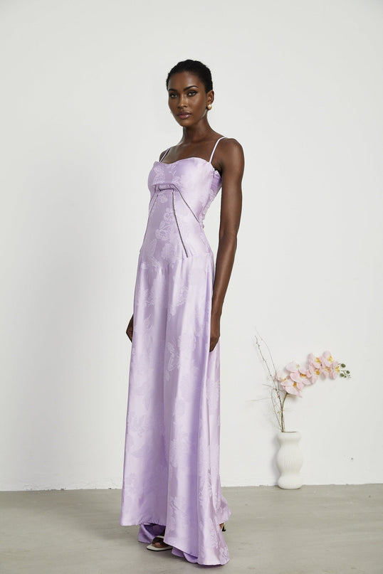 Valerie Purple Seraphina Jacquard Maxi Dress Spaghetti Strap Sleeveless Low Cut Neckline Jacquard Fabric Side Zip Fastening Rear Tie Fastening Maxi Length Design Elegant Graceful Glamour