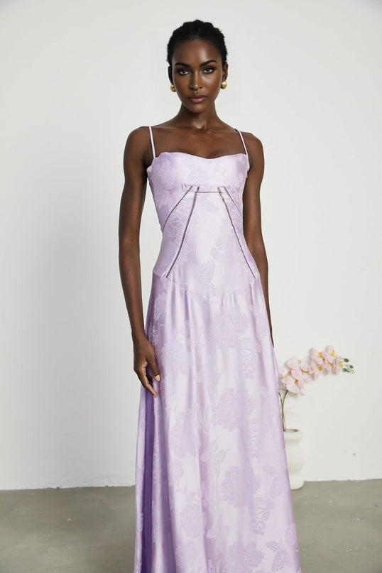 Valerie Purple Seraphina Jacquard Maxi Dress Spaghetti Straps Low-Cut Neckline Jacquard Fabric Side Zip Fastening Rear Tie Fastening Maxi Length Design Sizes Available Effortless Glamour