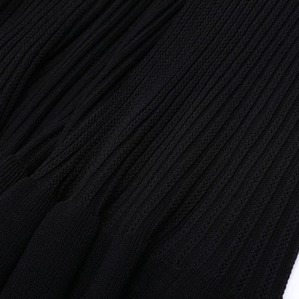 Van Hoef black knit maxi dress with double-breasted front and lapel neckline, rib texture, waist-defining shape, and flowing maxi hem for an elegant outfit