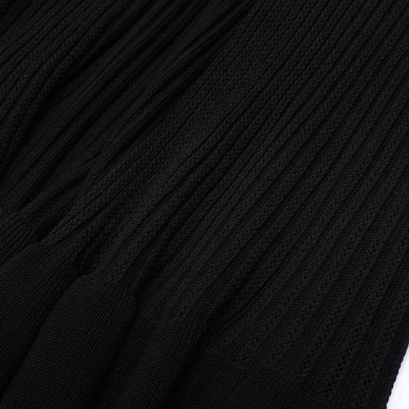 Van Hoef black knit maxi dress with double-breasted front and lapel neckline, rib texture, waist-defining shape, and flowing maxi hem for an elegant outfit