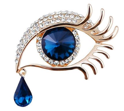 Van Hoef gold rhinestone brooch with deep blue crystal and teardrop element