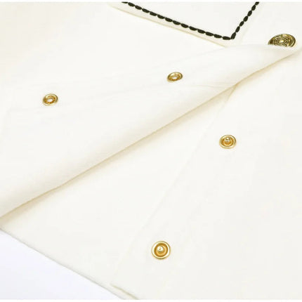 Van Hoef ivory white knit cardigan with black stitching and gold buttons