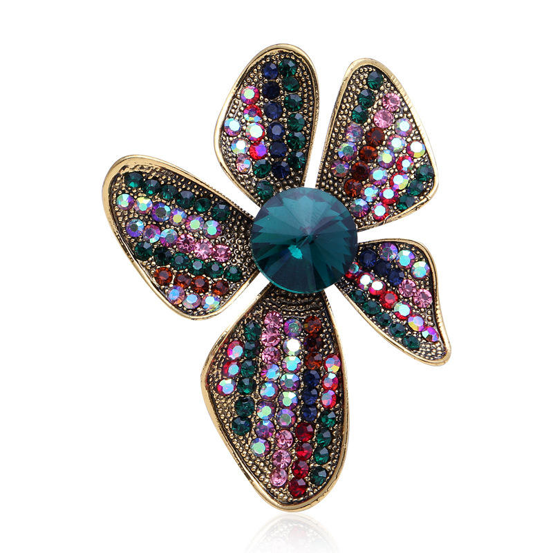 Van Hoef multicolor flower brooch with rhinestones and sparkling stone