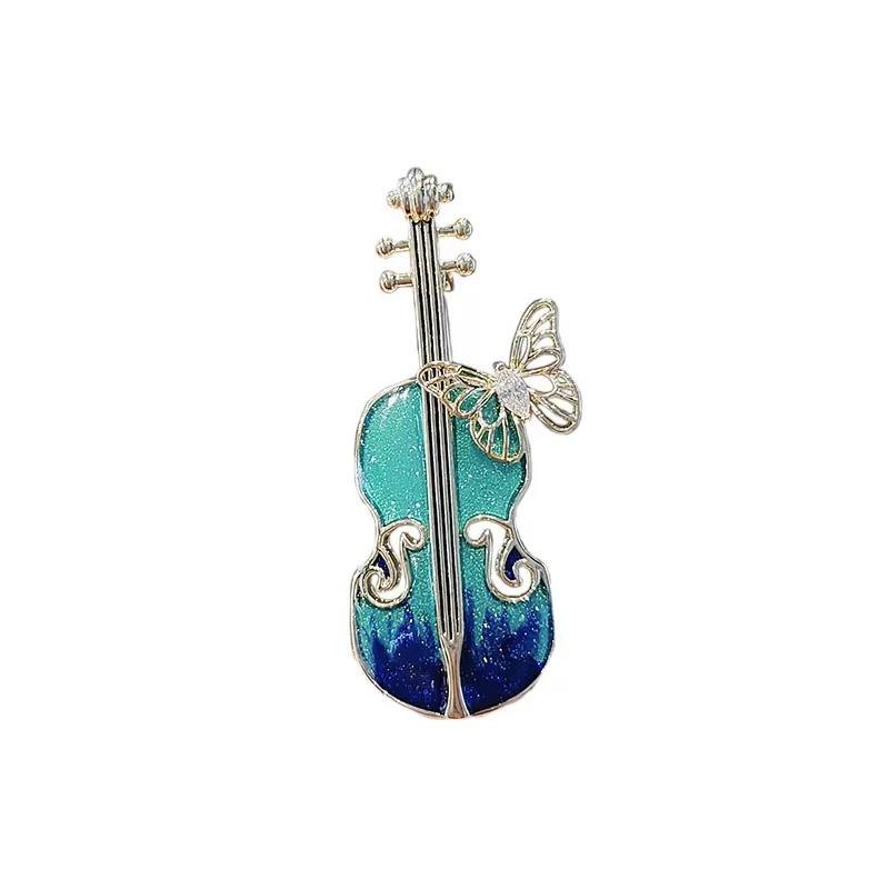 Van Hoef Teal Violin Brooch with Butterfly Accent