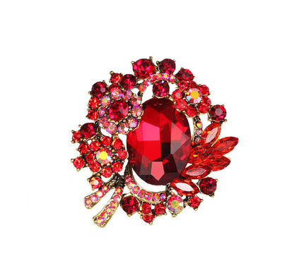 Van Hoef vintage brooch with red gemstones and crystals in intricate design