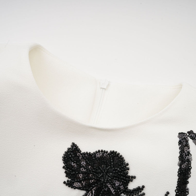 Vanessa white fauxflower embellished mini dress