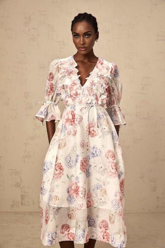 Vera White Floral Midi Dress with 3D Petal Detailing and Ruffled Cuffs
