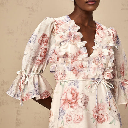 Vera White Floral Midi Dress with 3D Petal Detailing and Ruffled Cuffs