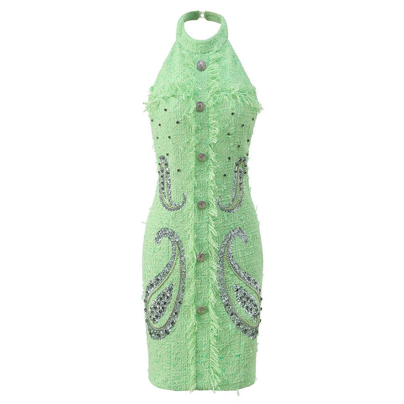 Vibrant mint green halter neck dress with rhinestone accents and frayed edges