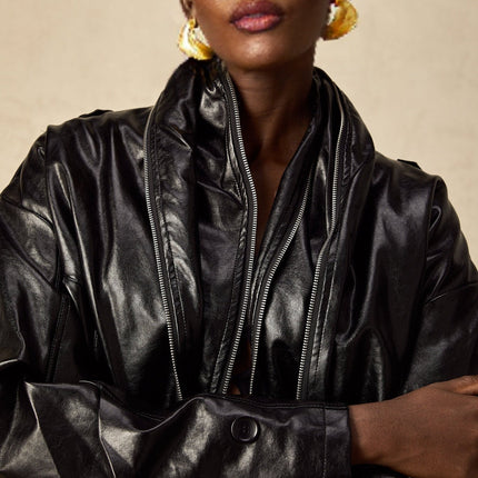 Virginie Black Cropped Faux Leather Jacket with Quilted Surface and Puffball Hem