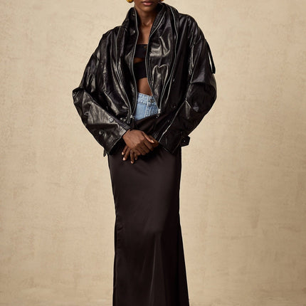 Virginie Black Faux Leather Cropped Jacket with Quilted Texture and Puffball Hem