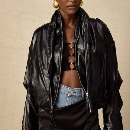 Virginie Black Faux Leather Cropped Jacket with Quilted Surface and Puffball Hem