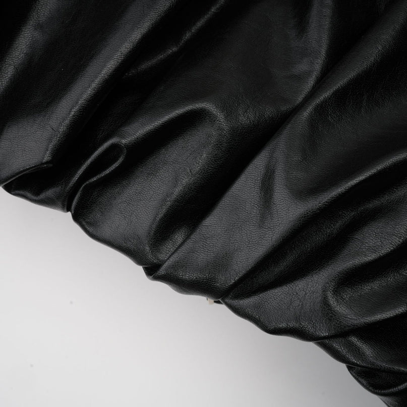 Virginie Black Faux Leather Jacket with Quilted Surface and Puffball Hem