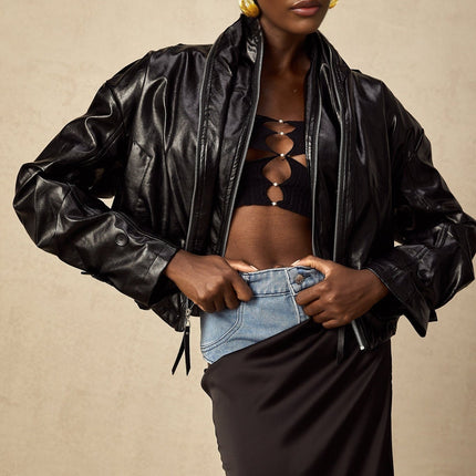 Virginie Black Faux Leather Jacket with Quilted Surface and Puffball Hem