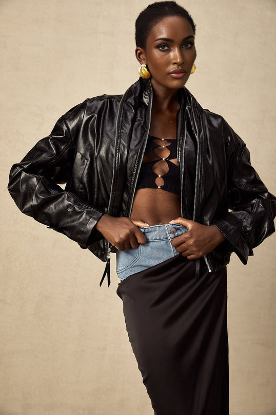 Virginie Black Faux Leather Jacket with Quilted Surface and Puffball Hem