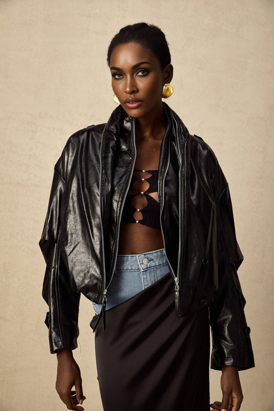Virginie Black Faux Leather Jacket with Quilted Surface and Puffball Hem