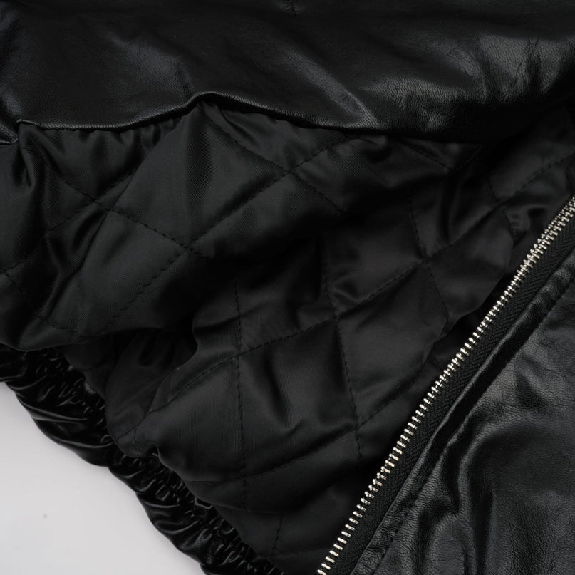 Virginie Black Faux Leather Jacket with Quilted Texture and Puffball Hem