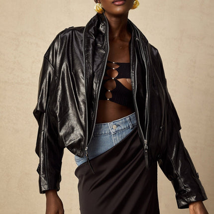Virginie Black Faux Leather Jacket with Quilted Surface and Puffball Hem