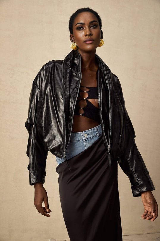 Virginie Black Faux Leather Jacket with Quilted Surface and Puffball Hem