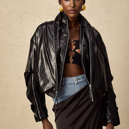 Virginie Cropped Faux Leather Jacket in Black with Quilted Surface and Puffball Hem