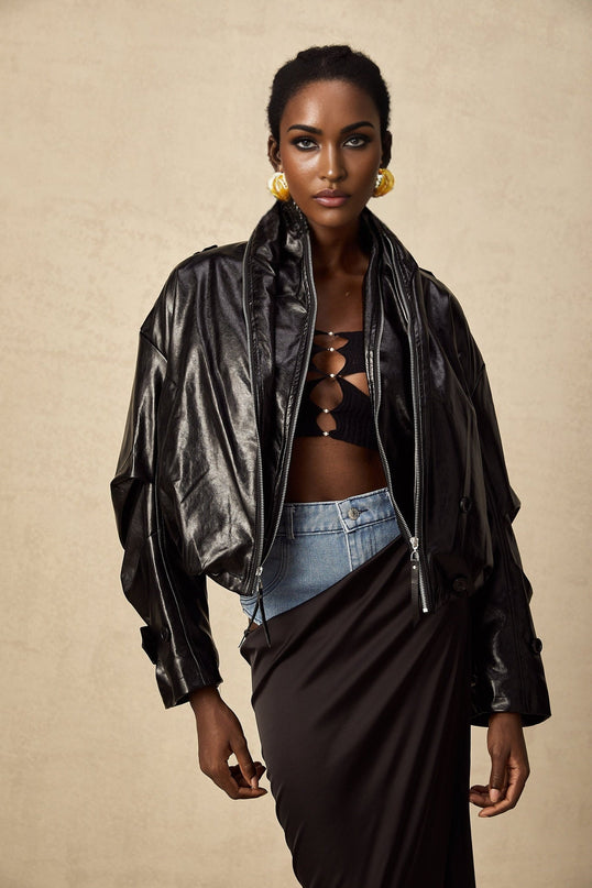 Virginie Cropped Faux Leather Jacket in Black with Quilted Surface and Puffball Hem
