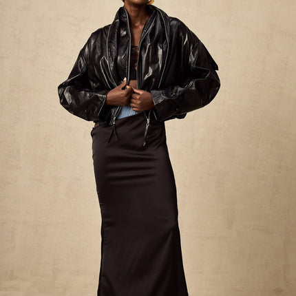 Virginie Cropped Faux Leather Jacket in Black with Quilted Texture and Puffball Hem